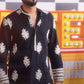 black kurta with  heavy white thread embroidery