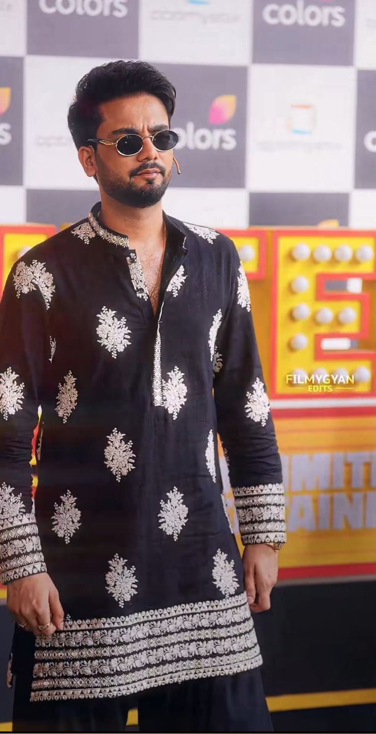 black kurta with  heavy white thread embroidery