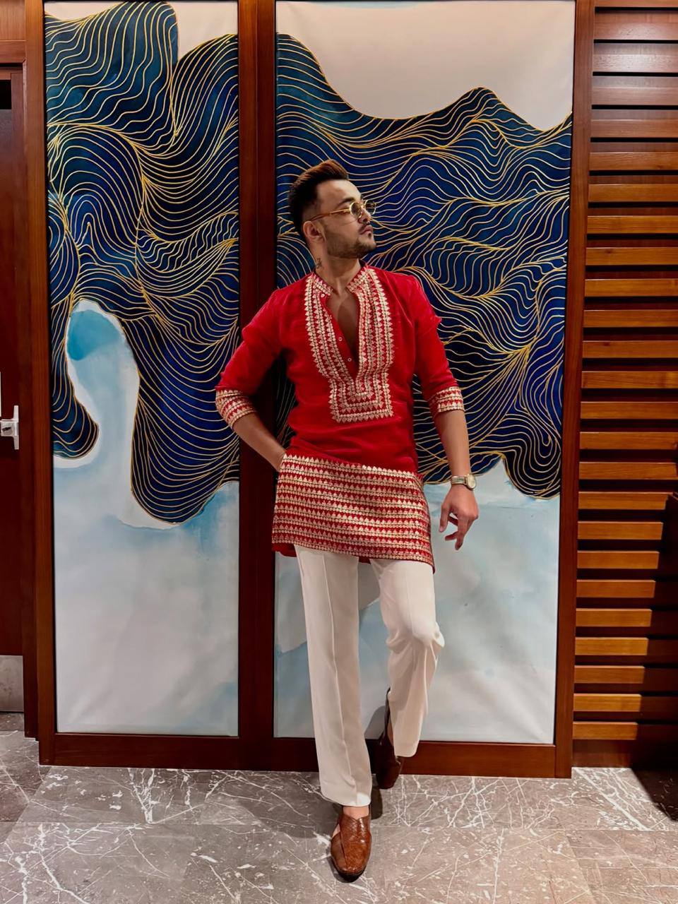 RED EMBROIDERED KURTA PANT SET.