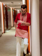 RED EMBROIDERED KURTA PANT SET.