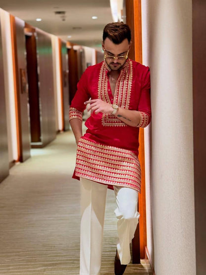 RED EMBROIDERED KURTA PANT SET.