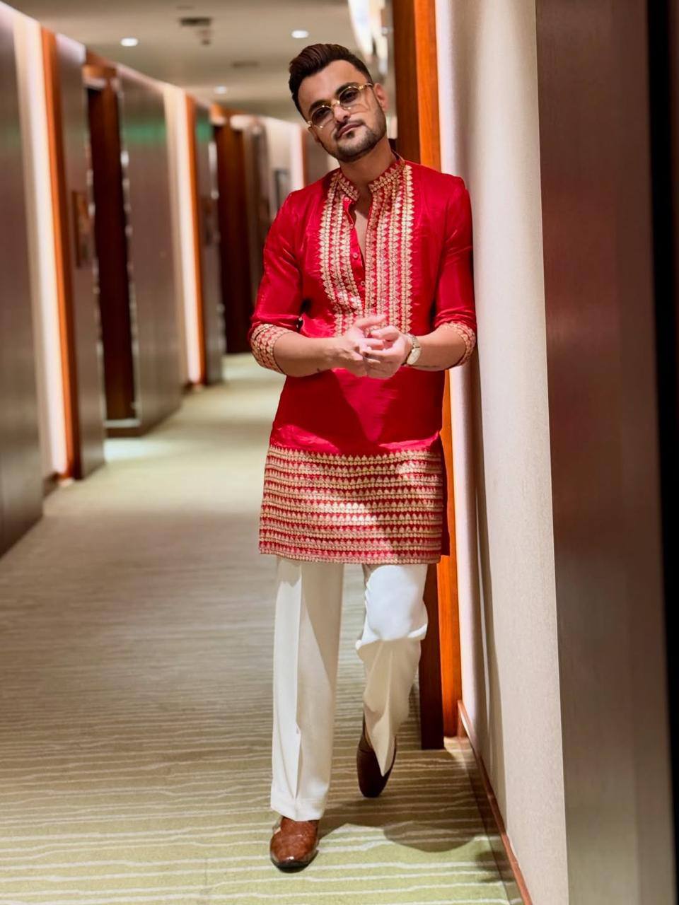 RED EMBROIDERED KURTA PANT SET.